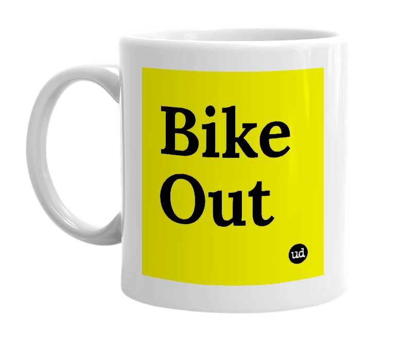 White mug with 'Bike Out' in bold black letters