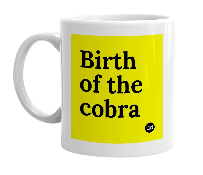 White mug with 'Birth of the cobra' in bold black letters