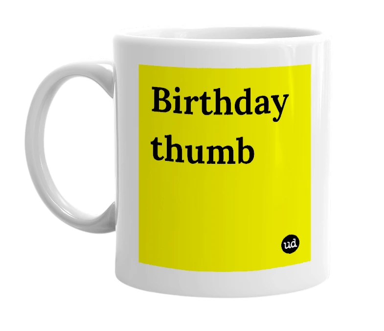 White mug with 'Birthday thumb' in bold black letters