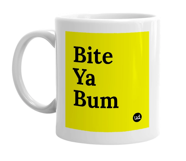 White mug with 'Bite Ya Bum' in bold black letters
