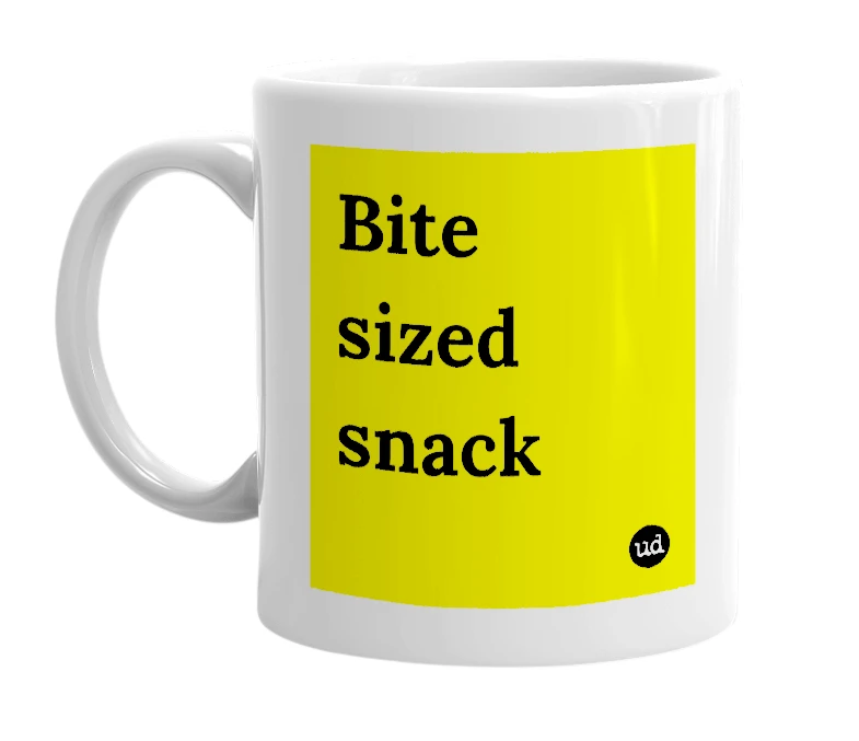White mug with 'Bite sized snack' in bold black letters