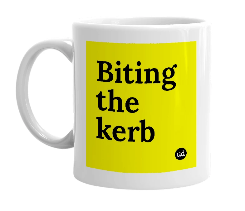 White mug with 'Biting the kerb' in bold black letters