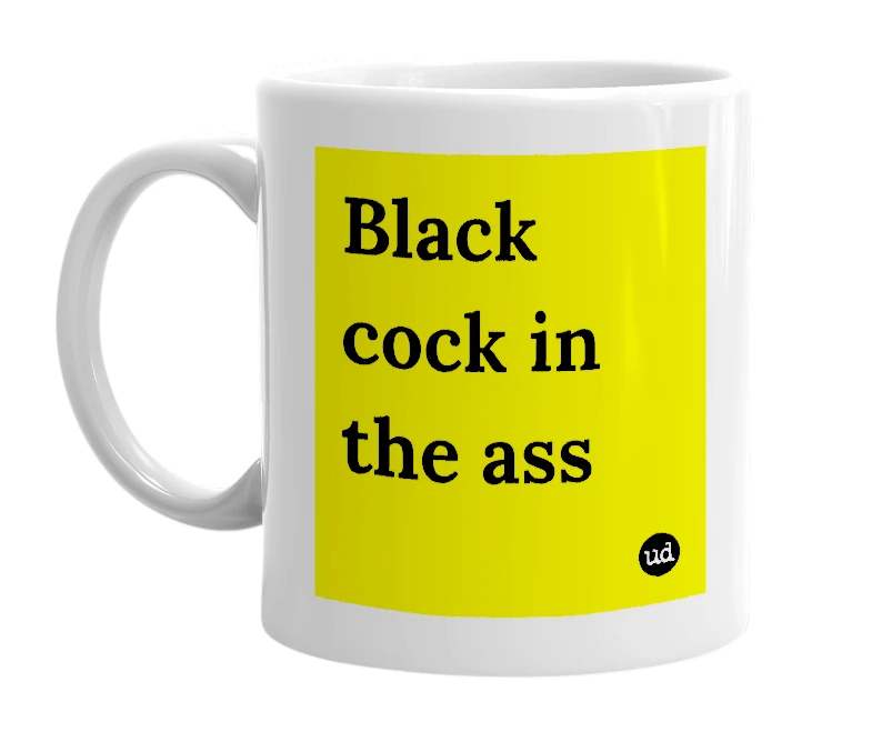 White mug with 'Black cock in the ass' in bold black letters