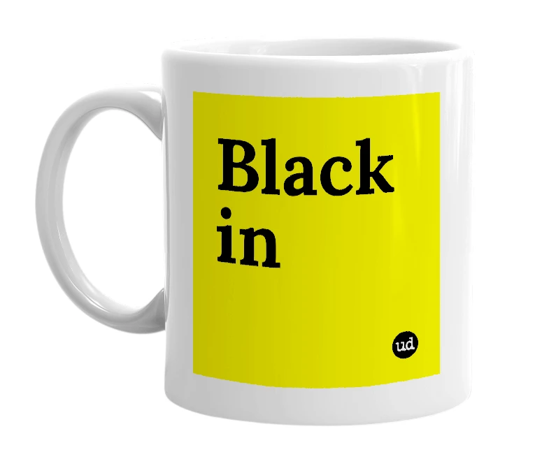 White mug with 'Black in' in bold black letters