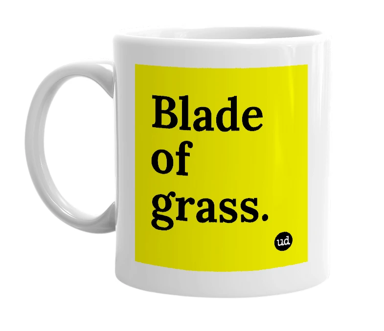 White mug with 'Blade of grass.' in bold black letters