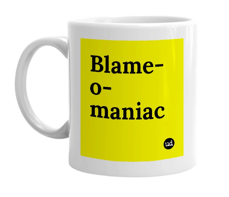 White mug with 'Blame-o-maniac' in bold black letters