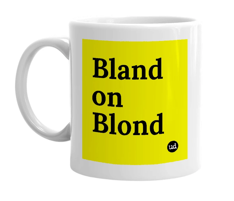 White mug with 'Bland on Blond' in bold black letters