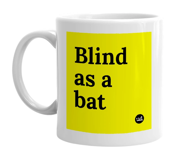 White mug with 'Blind as a bat' in bold black letters
