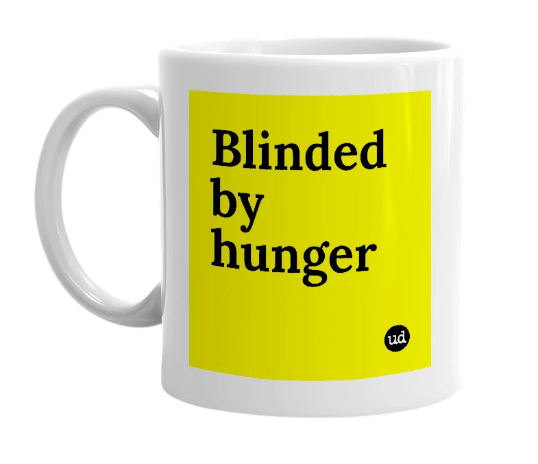 White mug with 'Blinded by hunger' in bold black letters