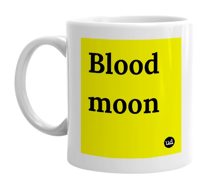 White mug with 'Blood moon' in bold black letters