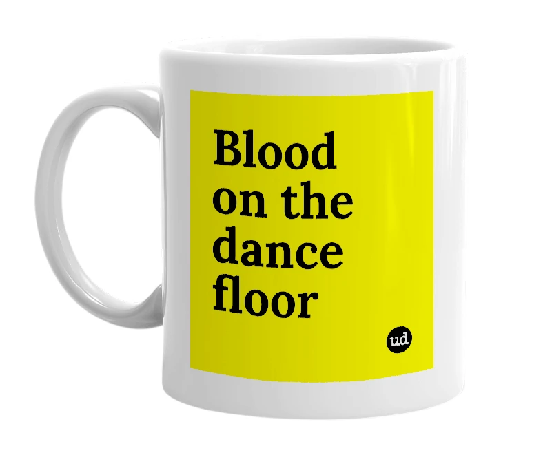 White mug with 'Blood on the dance floor' in bold black letters