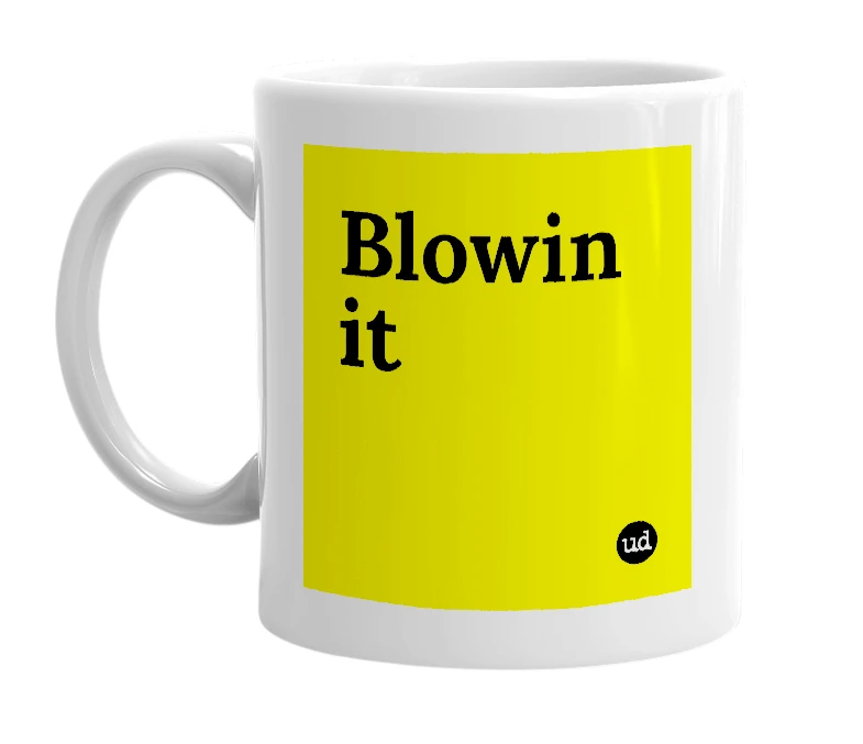 White mug with 'Blowin it' in bold black letters