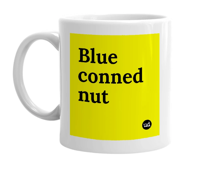 White mug with 'Blue conned nut' in bold black letters