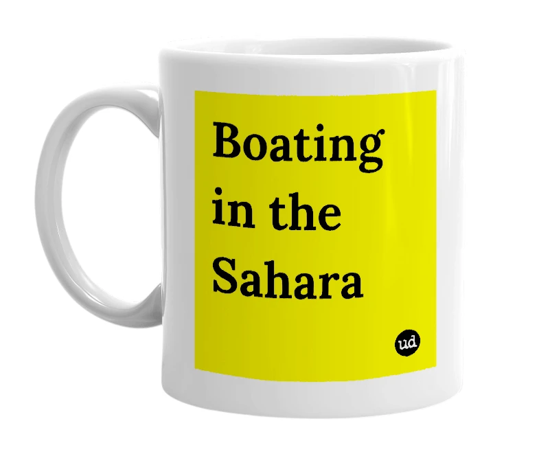 White mug with 'Boating in the Sahara' in bold black letters