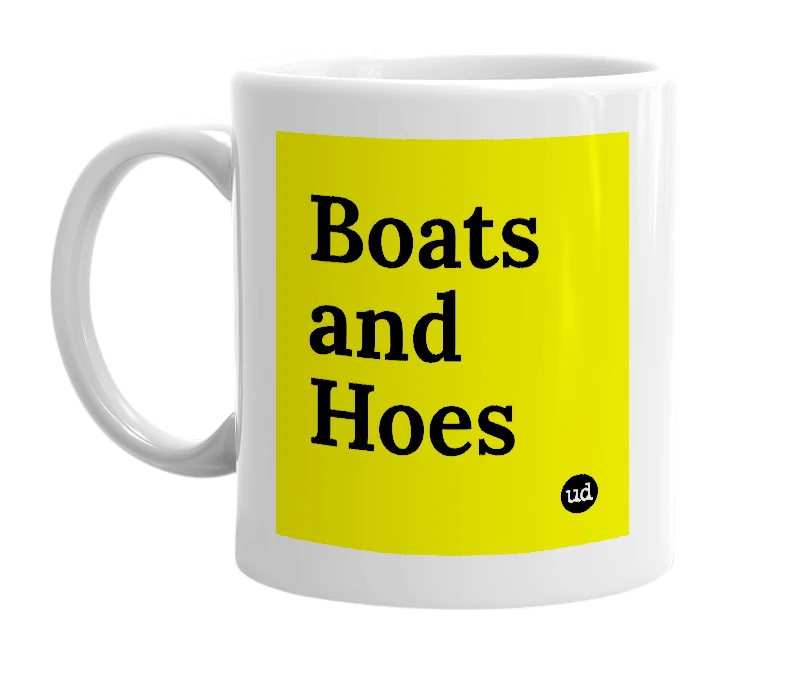 White mug with 'Boats and Hoes' in bold black letters