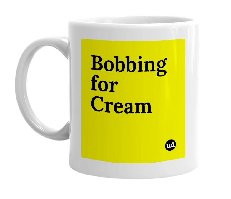 White mug with 'Bobbing for Cream' in bold black letters