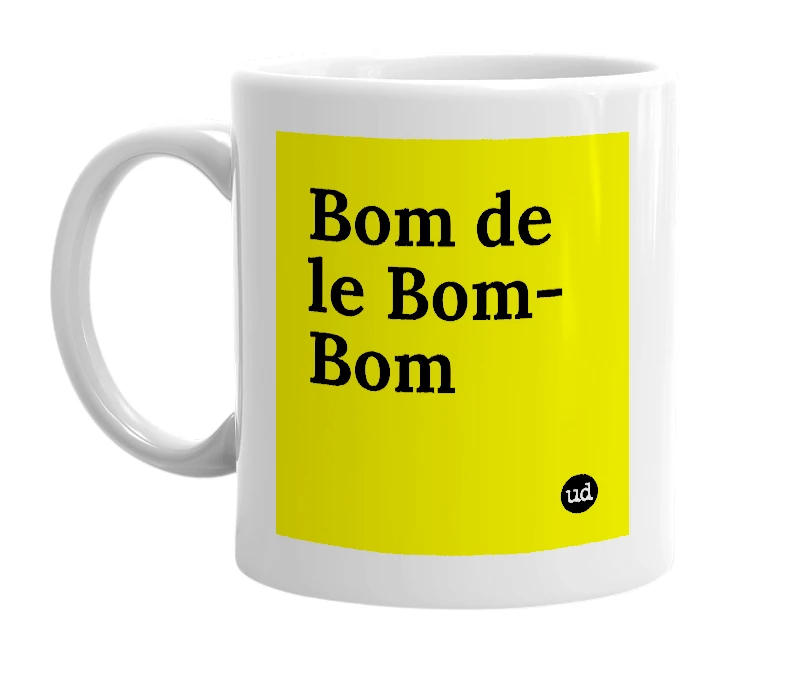 White mug with 'Bom de le Bom-Bom' in bold black letters