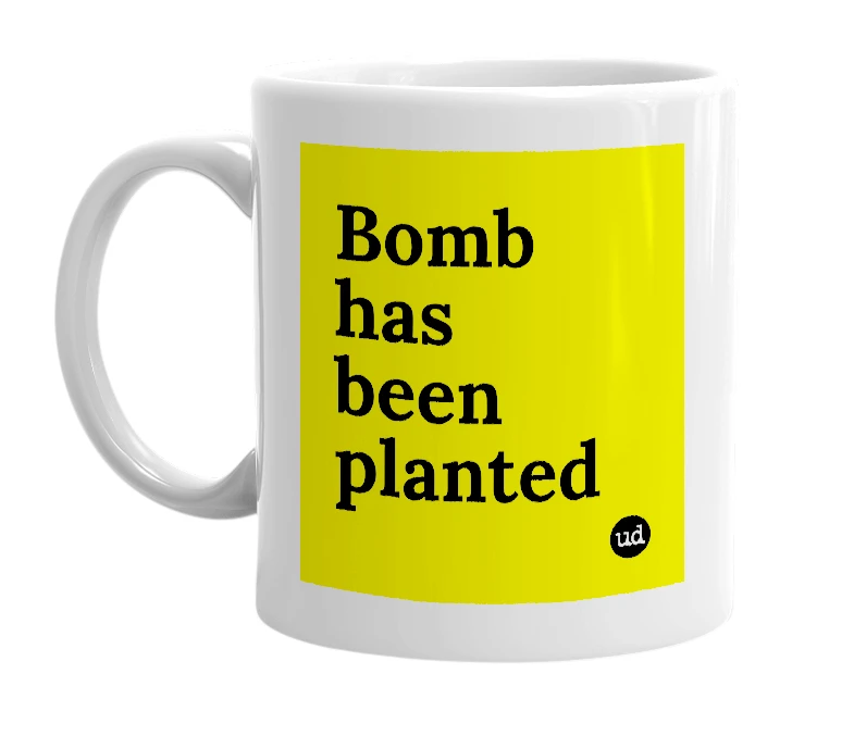 White mug with 'Bomb has been planted' in bold black letters