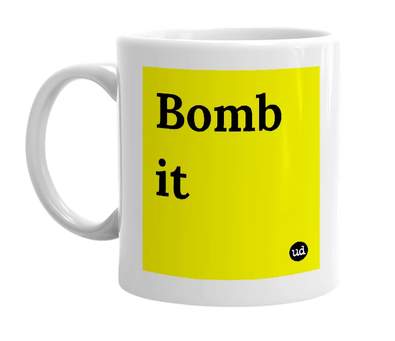 White mug with 'Bomb it' in bold black letters