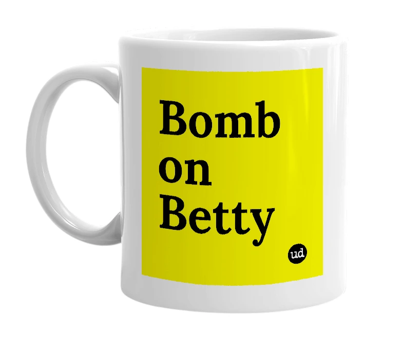 White mug with 'Bomb on Betty' in bold black letters