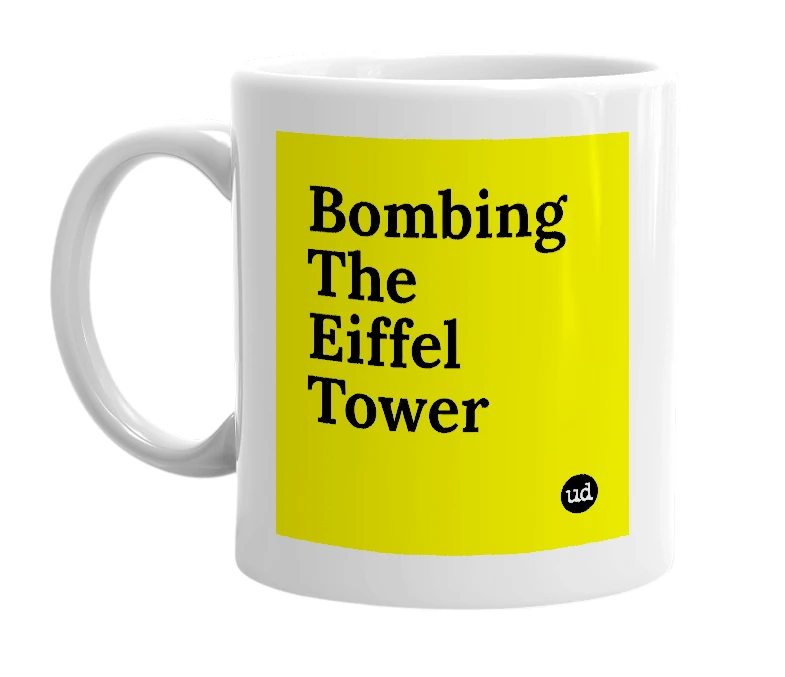 White mug with 'Bombing The Eiffel Tower' in bold black letters