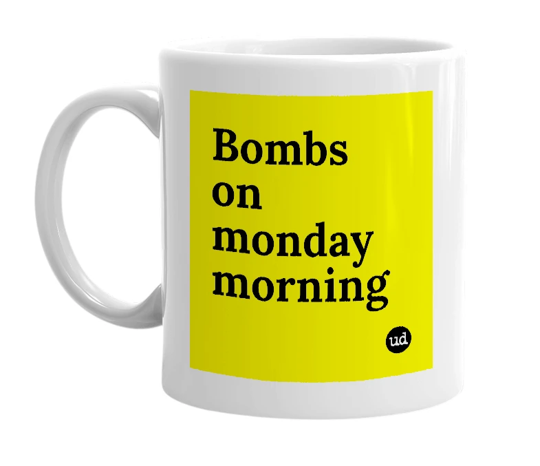 White mug with 'Bombs on monday morning' in bold black letters
