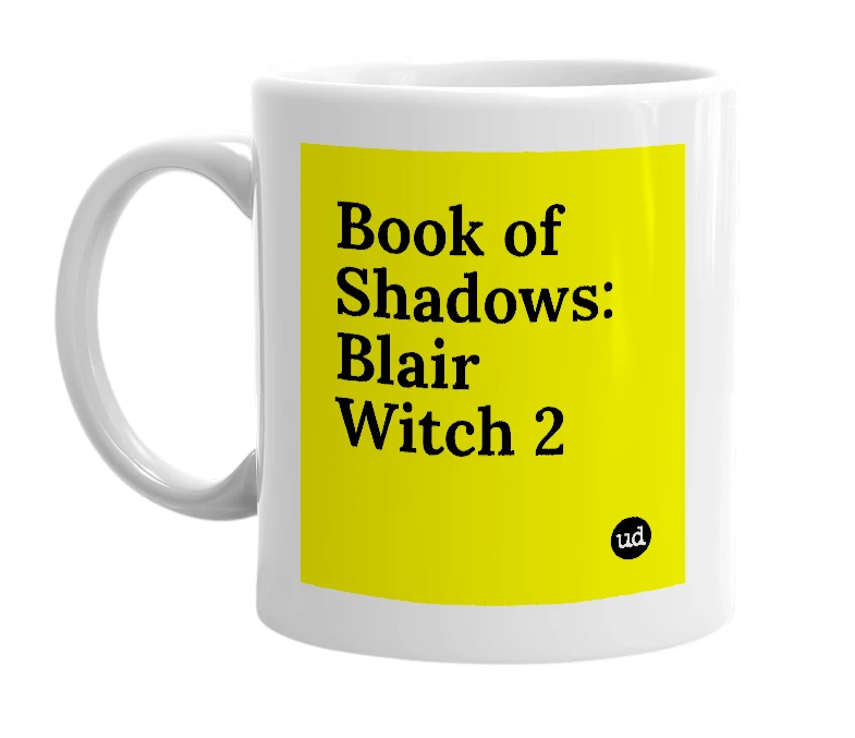 White mug with 'Book of Shadows: Blair Witch 2' in bold black letters