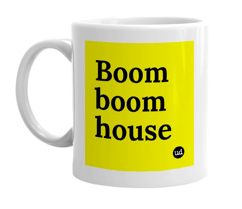 White mug with 'Boom boom house' in bold black letters