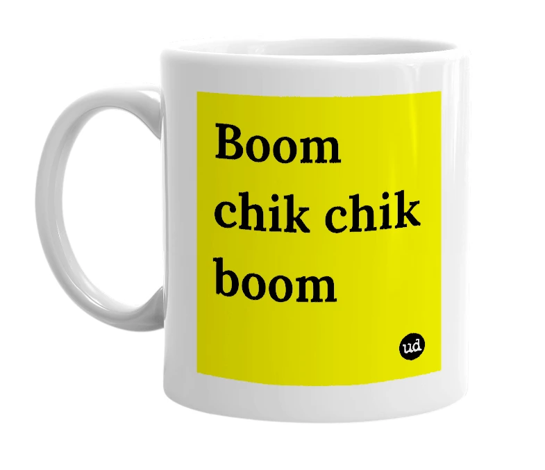 White mug with 'Boom chik chik boom' in bold black letters