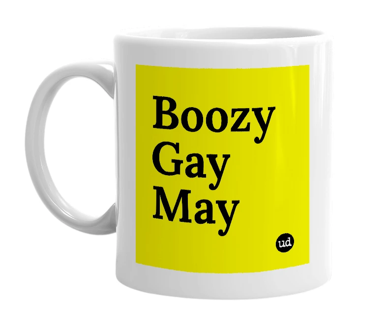 White mug with 'Boozy Gay May' in bold black letters