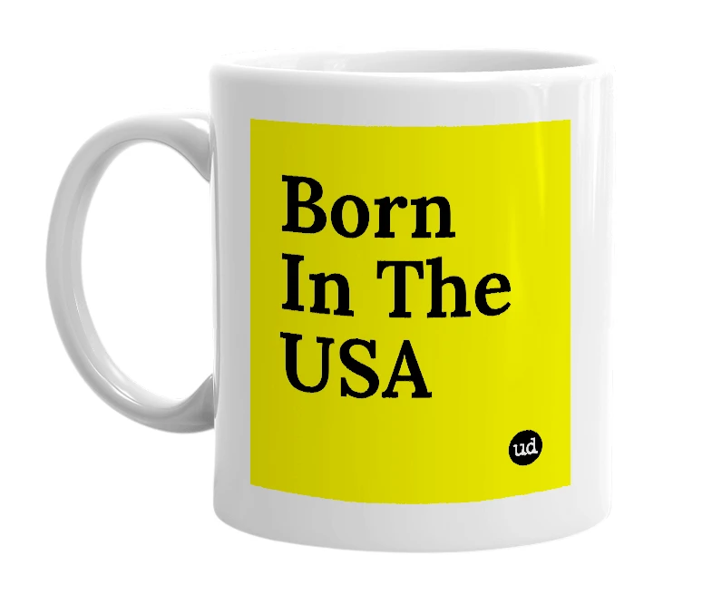 White mug with 'Born In The USA' in bold black letters