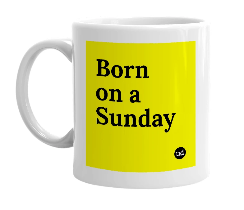 White mug with 'Born on a Sunday' in bold black letters