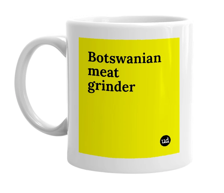 White mug with 'Botswanian meat grinder' in bold black letters