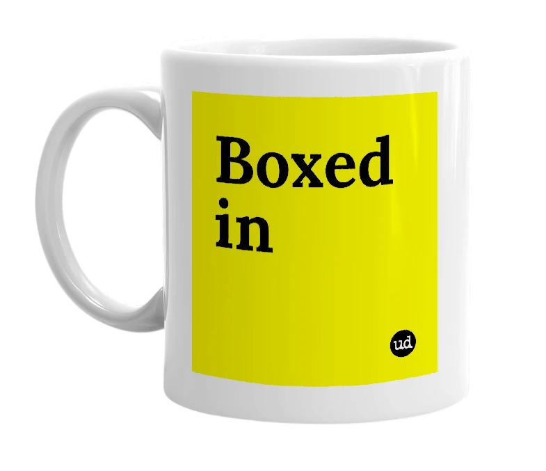 White mug with 'Boxed in' in bold black letters