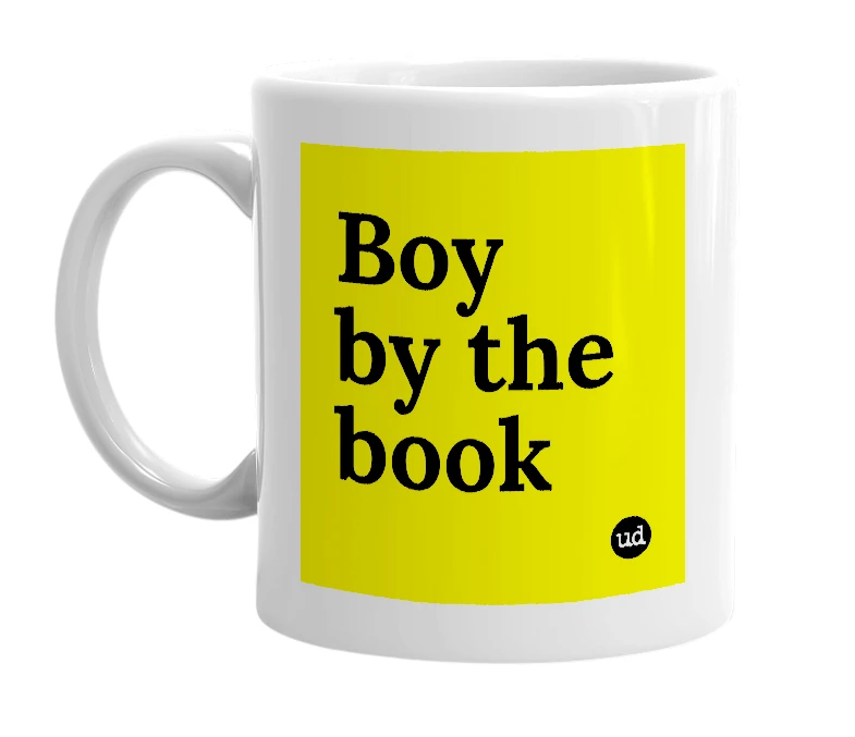White mug with 'Boy by the book' in bold black letters
