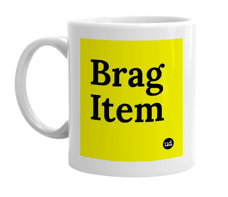 White mug with 'Brag Item' in bold black letters