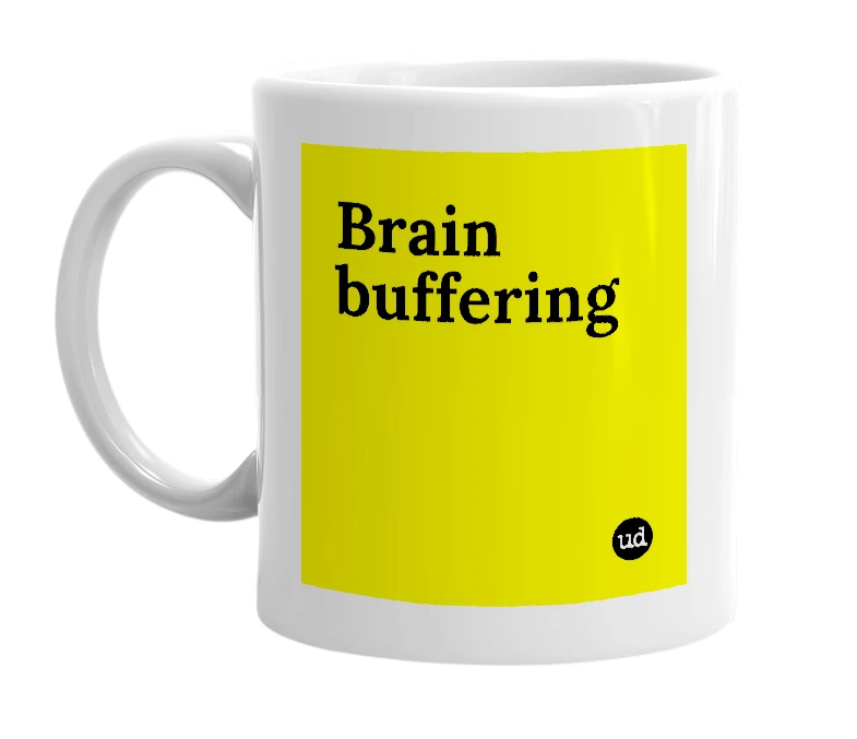 White mug with 'Brain buffering' in bold black letters