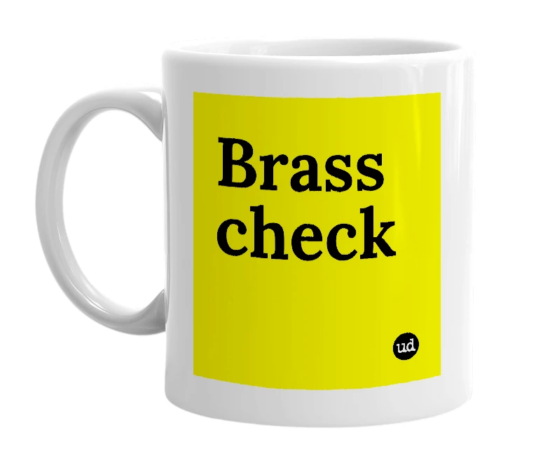 White mug with 'Brass check' in bold black letters