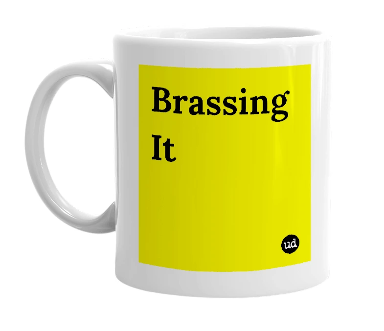 White mug with 'Brassing It' in bold black letters