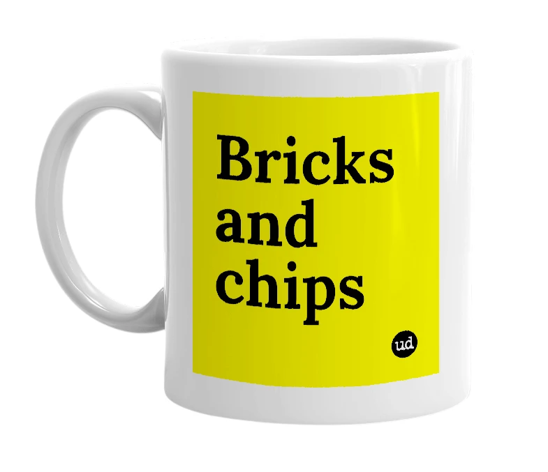 White mug with 'Bricks and chips' in bold black letters