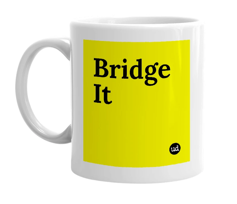 White mug with 'Bridge It' in bold black letters