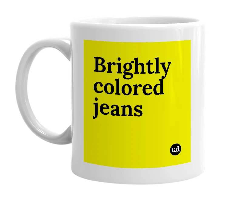 White mug with 'Brightly colored jeans' in bold black letters