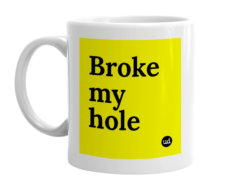 White mug with 'Broke my hole' in bold black letters