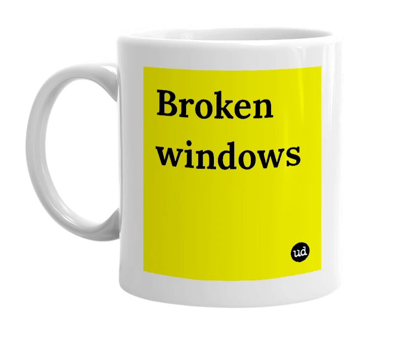 White mug with 'Broken windows' in bold black letters