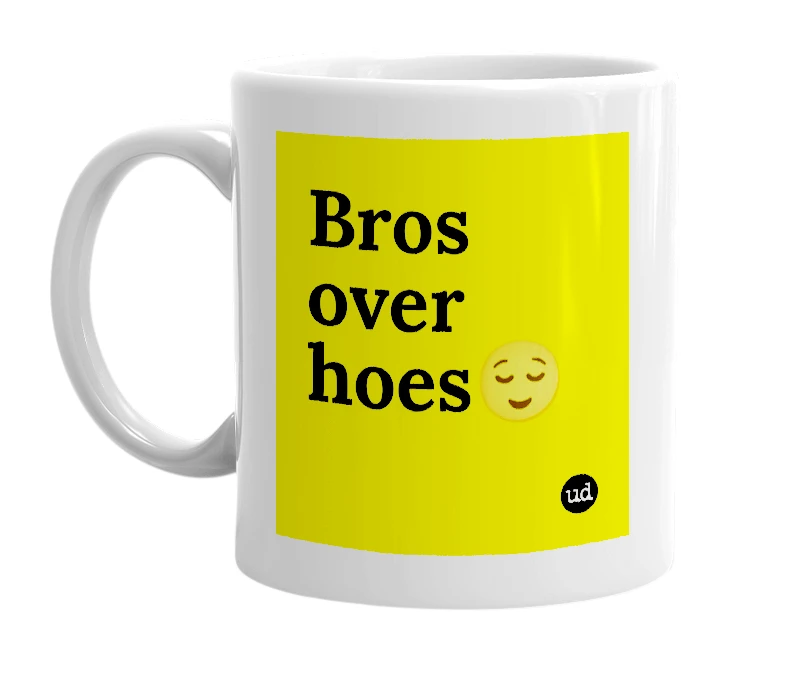 White mug with 'Bros over hoes😌' in bold black letters