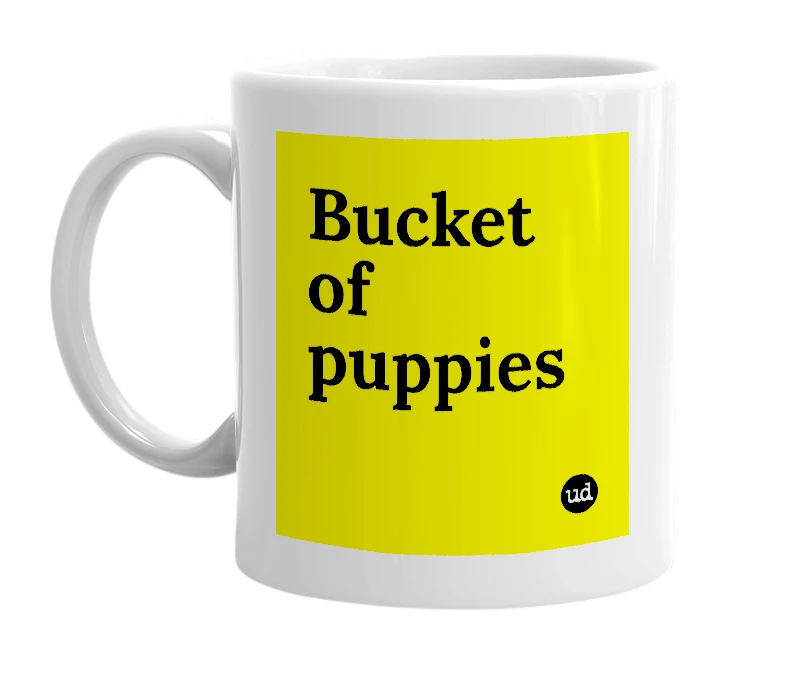 White mug with 'Bucket of puppies' in bold black letters