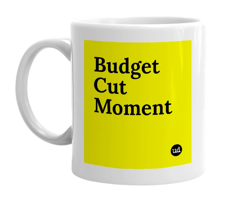 White mug with 'Budget Cut Moment' in bold black letters