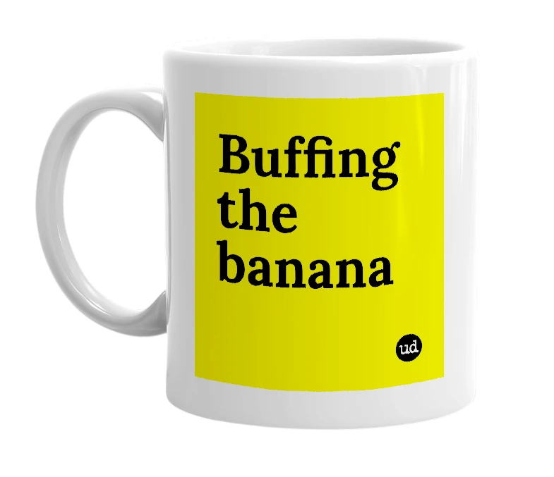 White mug with 'Buffing the banana' in bold black letters