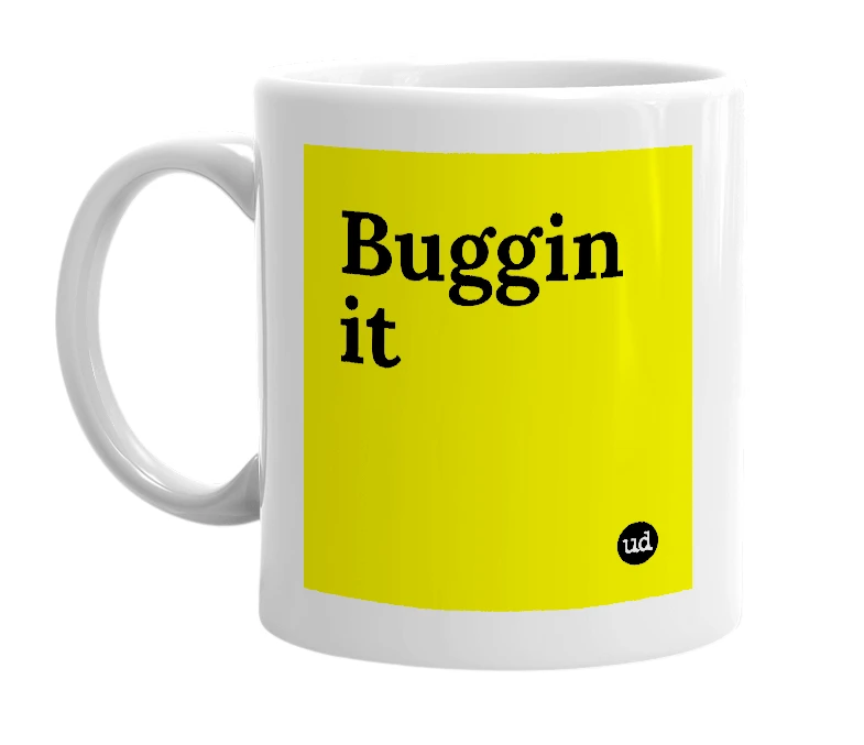 White mug with 'Buggin it' in bold black letters