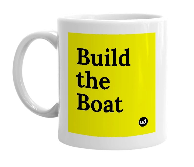 White mug with 'Build the Boat' in bold black letters